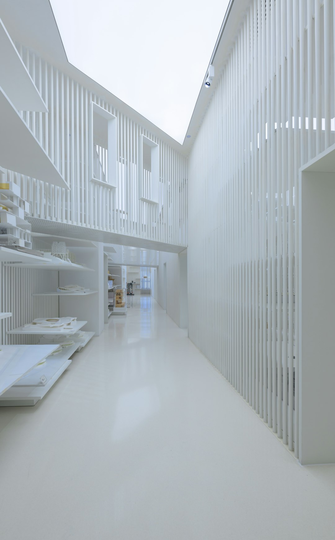 Services a-room-with-white-walls-and-shelves-filled-with-books-jop88ibsjdi